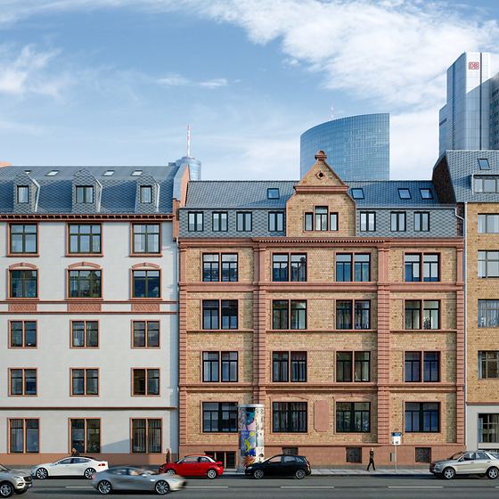 Häuserzeile in der Elbestraße mit Blick auf die Skyline